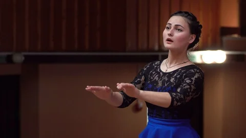 Choir conductor during performance Stock Footage 93523639