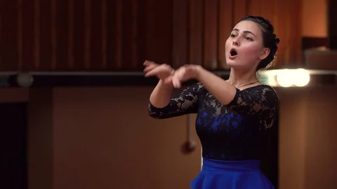 Choir conductor during performance Stock Footage 93523868