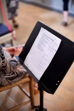 Choir with notes in hands, overhead view Stock Photos