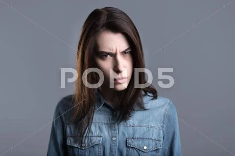 Choleric young woman Stock Photos
