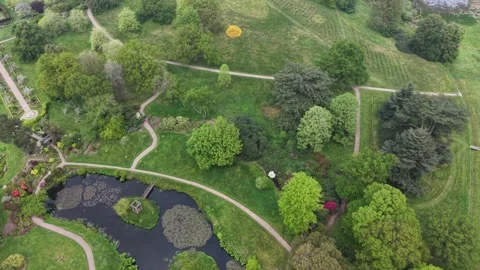Cholmondeley Castle drone gimbal down, rise up and reveal Stock Footage 335031037