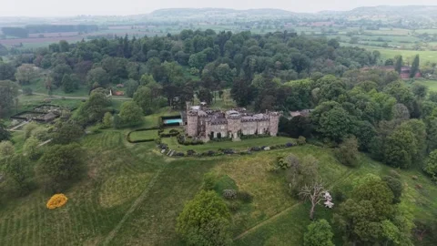 Cholmondeley Castle drone rotate, pull out then move in Stock Footage 335031241