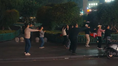 Chongqing Locals Dancing in Public Square at Night Traditional Chinese Square Stock Footage 334722498