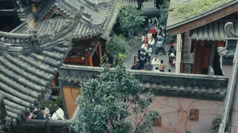 Chongqing Luohan Temple Overhead View of Tiled Rooftop with Golden Prayer Stock Footage 336276105