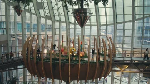 Chongqing The Ring Mall Atrium Interior with Suspended Trees Metallic Cones and Stock Footage 336468907
