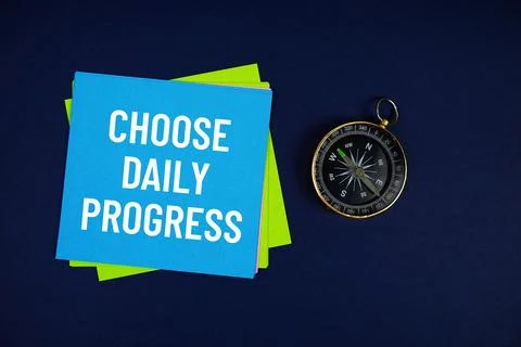 Choose Daily Progress text written on sticky note with compass on blue  bac.. Stock Photos