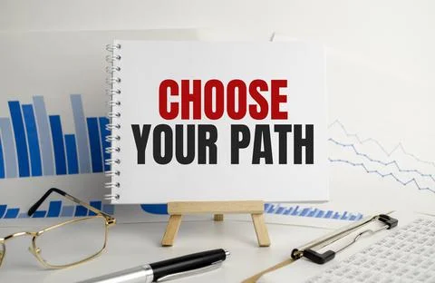 CHOOSE YOUR PATH, text on white paper on the light background with charts pap Stock-Fotos