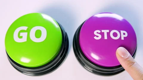 Choosing between Go and Stop button. Turn on or off. Pause or start an action. Stock Footage 145912146