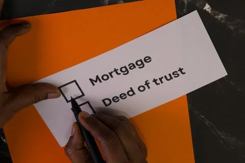 Choosing between mortgage and deed of trust options Stock Photos