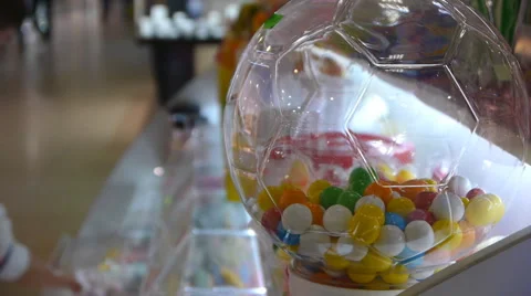 Choosing Candy In Shopping Center Stock Footage 56059080