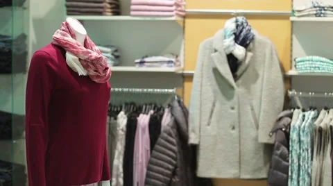 Choosing clothes in the store Video stock 61070363