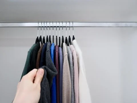 Choosing Clothes from Wardrobe Фото