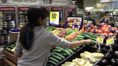 Choosing Cucumbers Video stock 24613924