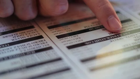 Choosing a dish from the menu in restaurant Stock Footage 70943318