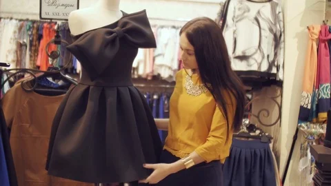 Choosing dresses Stock Footage 72070553