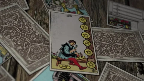 Choosing Eight of Pentacles for a focus from the mystic tarot cards deck Stock Footage 247228926