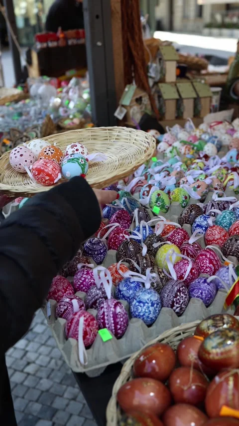 Choosing handmade easter eggs at market Video stock 331811966