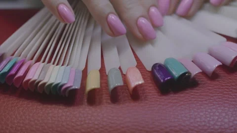 Choosing nail colours Stock Footage 267754614