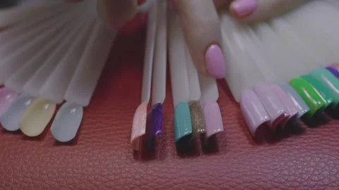 Choosing nail colours Stock Footage 267755022