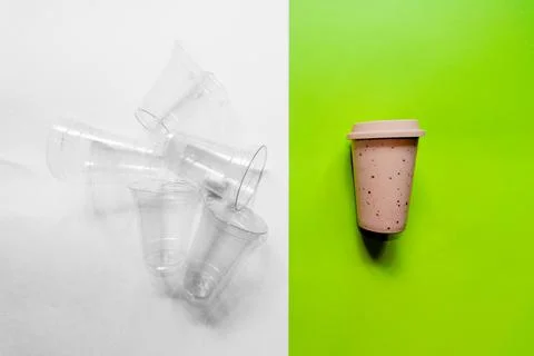 Choosing a single reusable cup over a disposable plastic cup. Stock Photos