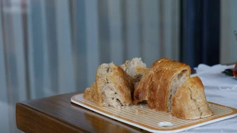 Choosing a slice of whole wheat bread for breakfast. Stock Footage 274368540