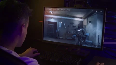 Choosing a swat trooper character and launching a match in the computer game Stock Footage 305941354