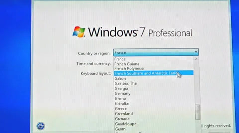 Choosing time zone, currency and country new computer Stock Footage 37891390