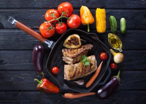 Chop on the bone grill pan Stock Photos