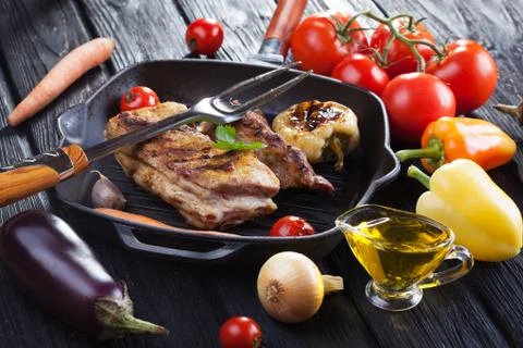Chop on the bone grill pan Stock Photos