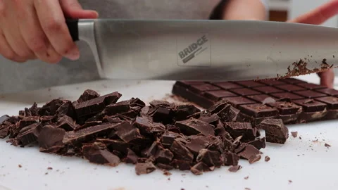 Chop Chocolate on white cutting board Stock Footage 200969732