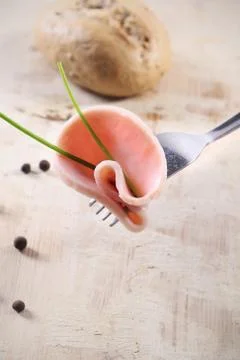 Chop meat on a fork Stock Photos