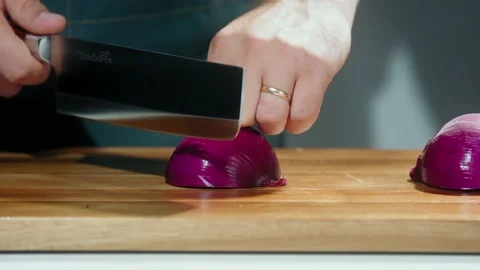 Chop the onion slow motion Stock Footage 220665321