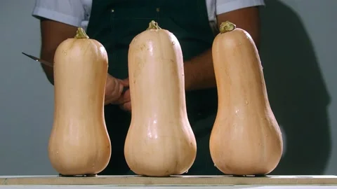 Chop the  pumpkins slow motion Stock Footage 237886583