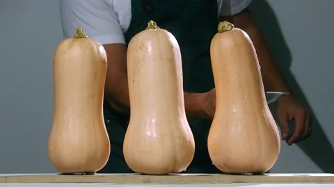 Chop the pumpkins slow motion Stock Footage 237886584