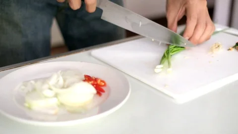 Chop scallion Stock Footage 73360249