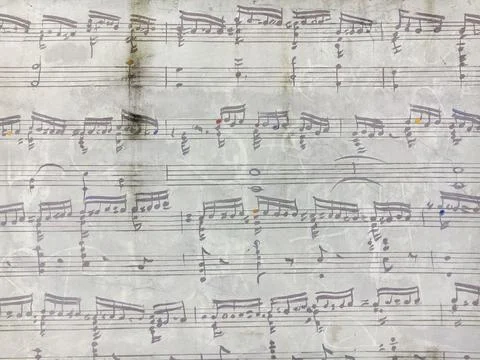 Chopin sheet music notes on the wall near  Warsaw Chopin museum. Musical back Stock Photos