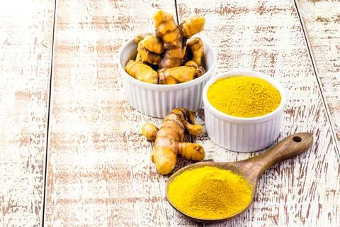 Chopped and powdered saffron on a table. Spicy culinary ingredient Stock Photos
