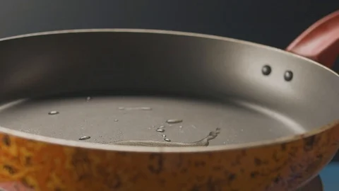 Chopped bell pepper slices falls into hot pan. Slow motion video 120fps Stock Footage 112220374
