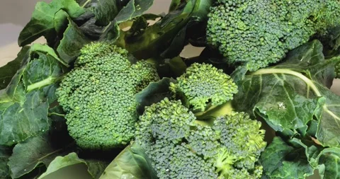 Chopped Broccoli pieces super close up slowly. Selective focus Vídeo Stock 149968923