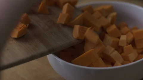 Chopped butternut squash in a bowl Stock Footage 127137890