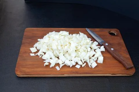Chopped cabbage on a cutting board Stock Photos