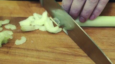 Chopped celery on a cutting board. Stock Footage 171649946