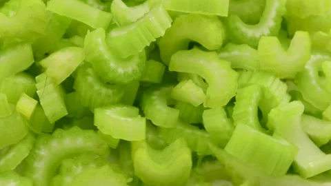 Chopped celery stalks, rotation in circle. green fresh celery, Turning. Stock Footage 276218634