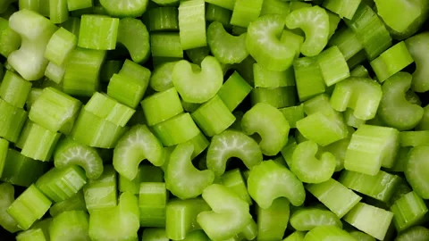 Chopped celery sticks top view, rotation Stock Footage 207456133