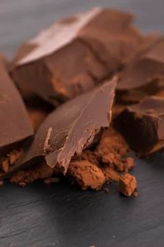 Chopped chocolate with cacao Stock Photos