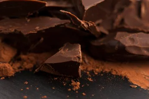 Chopped chocolate with cacao Stock Photos