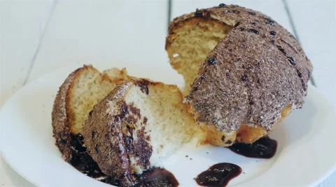 Chopped chocolate cake on a plate Stock Footage 58281368