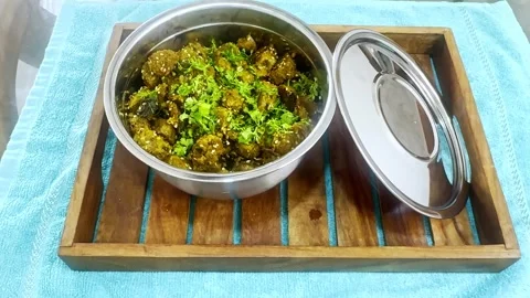 Chopped cilantro adorns the dish Stock Footage 307901730