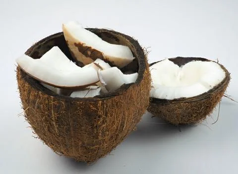 Chopped coconut. Shells, pieces of kernel. Isolated on white background 스톡 사진