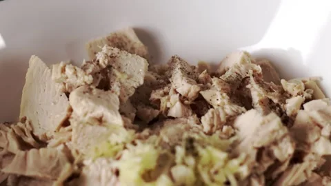 Chopped Cooked Chicken with a Fresh Ginger Garnish for a Flavorful Meal Stock Footage 303373756